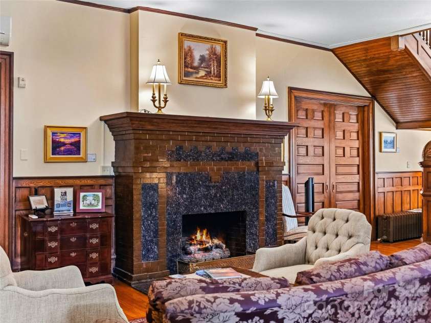 86 Edgemont Road, Asheville, NC 28801.  MLS# CAR4375523, YatesRealty ID 36581. Solid wood doors and detailed fireplace