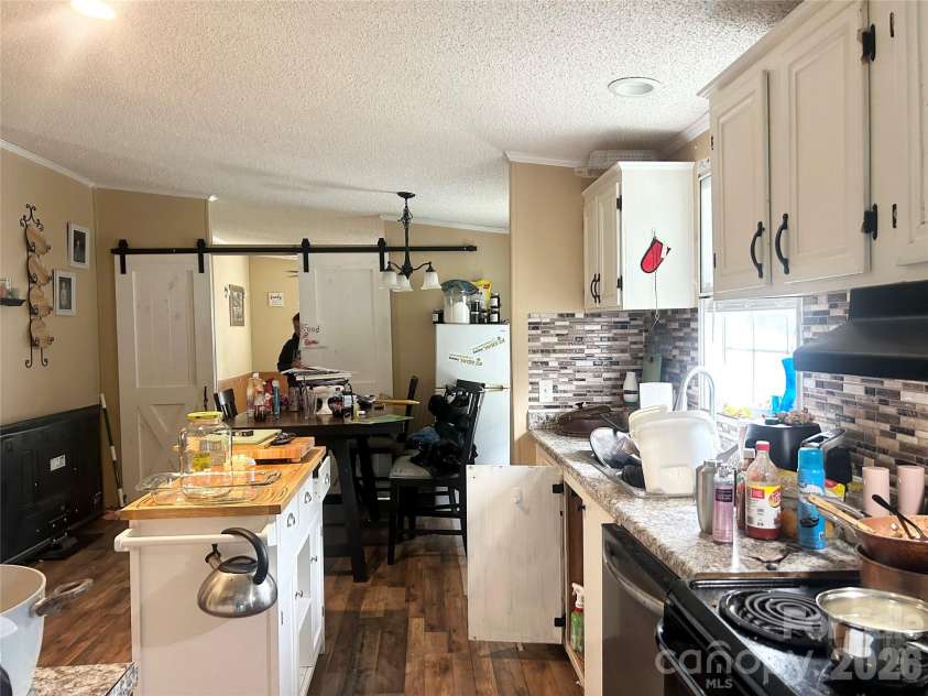 5100 Flay Road, Lincolnton, NC 28092.  MLS# CAR4428563, YatesRealty ID 36586. Kitchen view from Laundry Room