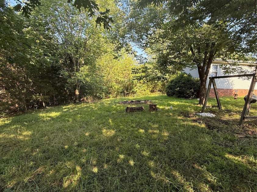6006 Vanderhorst Drive, Concord, NC 28205.  MLS# CAR4402290, YatesRealty ID 36591. 