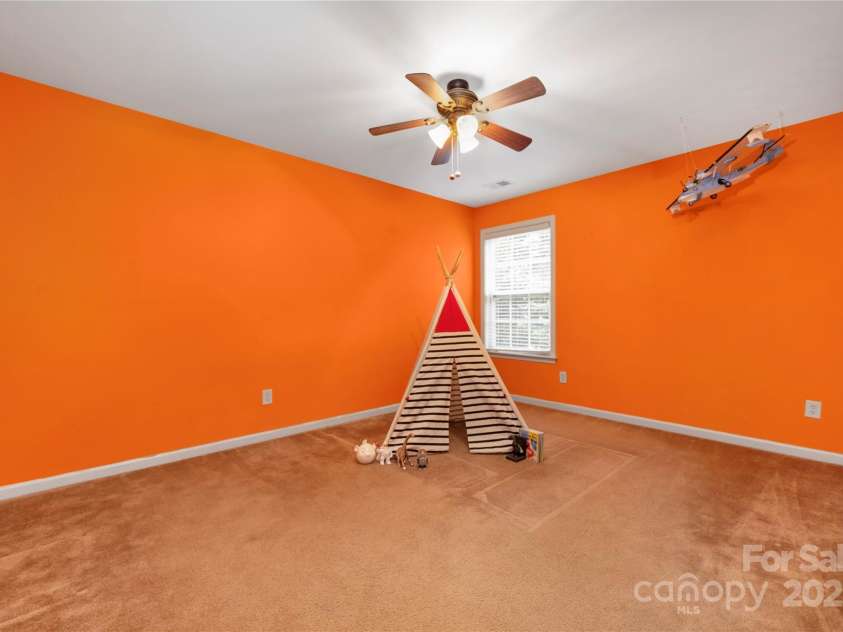 128 Lacona Trace, Mooresville, NC 28115.  MLS# CAR4222843, YatesRealty ID 3660. Guest bedroom