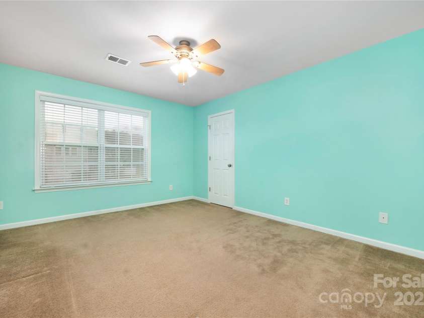 128 Lacona Trace, Mooresville, NC 28115.  MLS# CAR4222843, YatesRealty ID 3660. Guest bedroom
