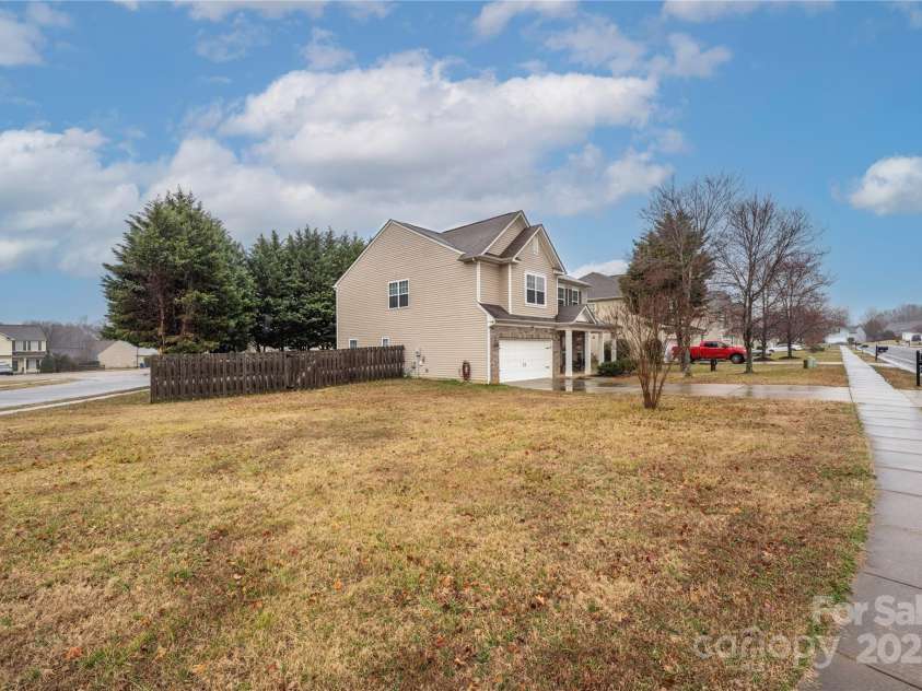 128 Lacona Trace, Mooresville, NC 28115.  MLS# CAR4222843, YatesRealty ID 3660. Large side lot great for sports or other activities