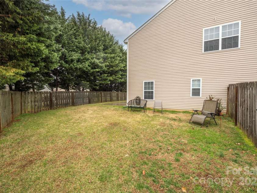 128 Lacona Trace, Mooresville, NC 28115.  MLS# CAR4222843, YatesRealty ID 3660. Private backyard