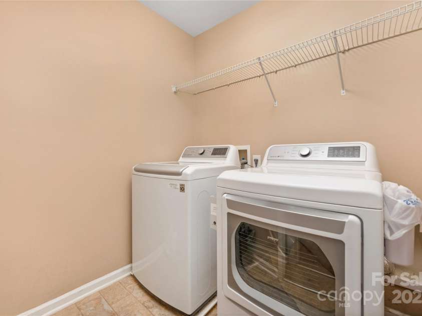 128 Lacona Trace, Mooresville, NC 28115.  MLS# CAR4222843, YatesRealty ID 3660. Upstairs laundry room