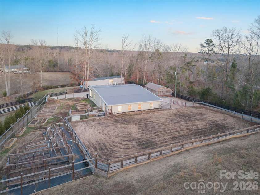 1780 Sierra Road, York, SC 29745.  MLS# CAR4335918, YatesRealty ID 3660. Back of workshop and arena