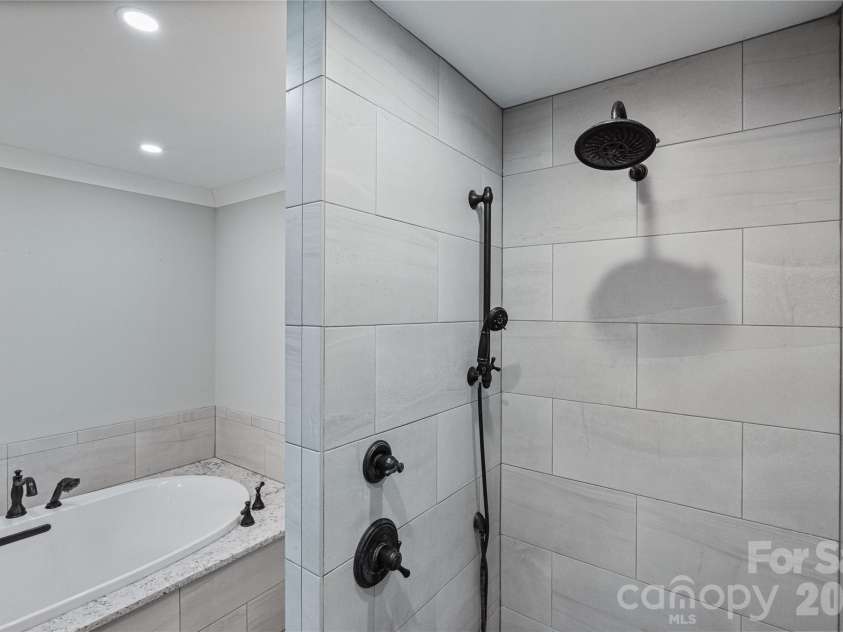 1780 Sierra Road, York, SC 29745.  MLS# CAR4335918, YatesRealty ID 3660. Primary bath shower and tub