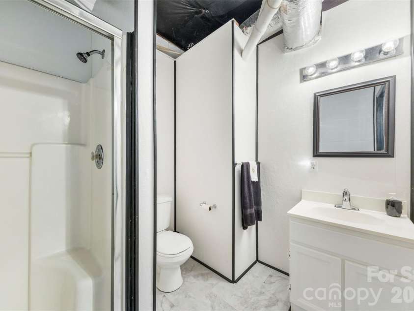 320 Huffstetler Lake Road, Dallas, NC 28034.  MLS# CAR4383842, YatesRealty ID 36603. Basement bathroom