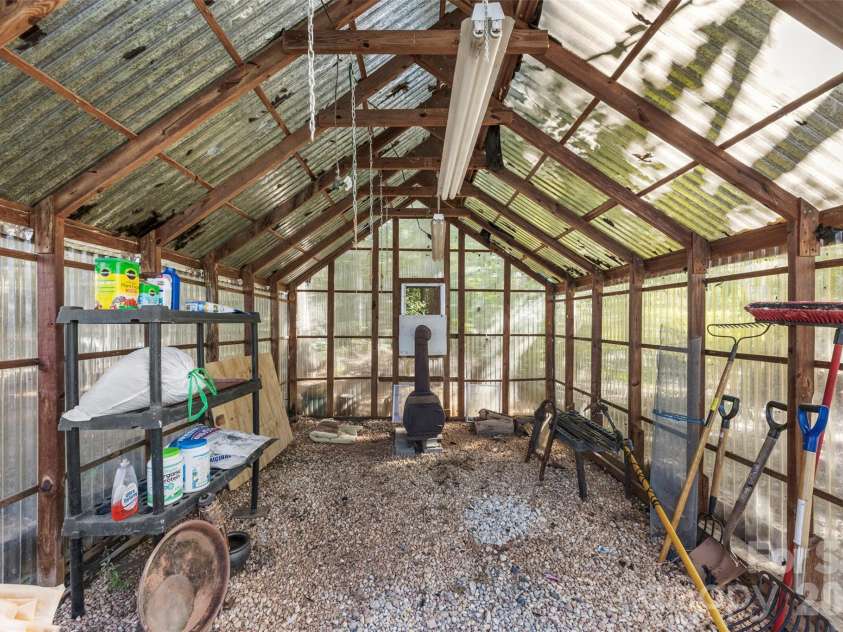320 Huffstetler Lake Road, Dallas, NC 28034.  MLS# CAR4383842, YatesRealty ID 36603. Green house
