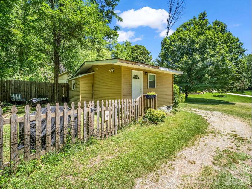 11 Charlie Hill Memorial Drive, Fairview, NC 28730.  MLS# CAR4398558, YatesRealty ID 36610. Driveway entry