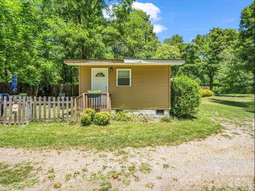 11 Charlie Hill Memorial Drive, Fairview, NC 28730.  MLS# CAR4398558, YatesRealty ID 36610. Driveway/tiny home