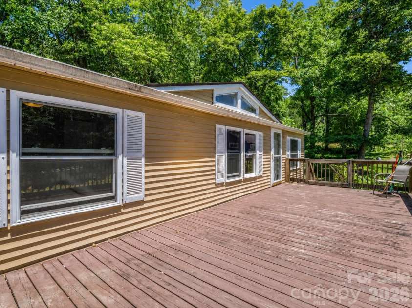 11 Charlie Hill Memorial Drive, Fairview, NC 28730.  MLS# CAR4398558, YatesRealty ID 36610. Expansive deck