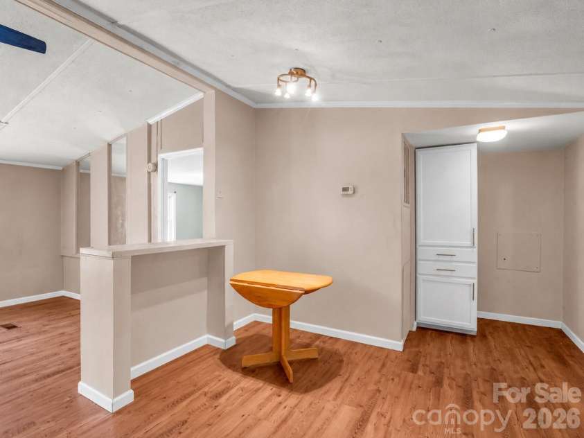 11 Charlie Hill Memorial Drive, Fairview, NC 28730.  MLS# CAR4398558, YatesRealty ID 36610. Main home dining area