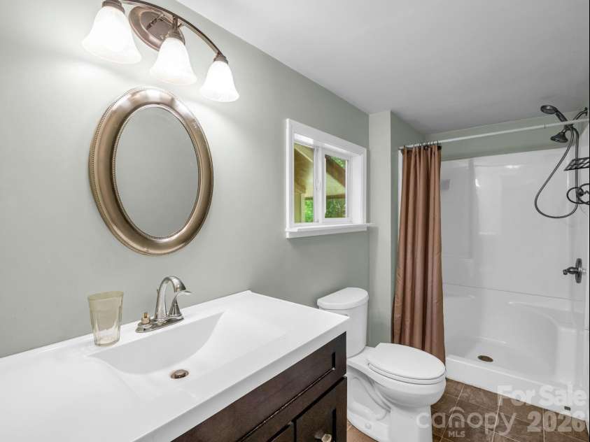 11 Charlie Hill Memorial Drive, Fairview, NC 28730.  MLS# CAR4398558, YatesRealty ID 36610. Main home full bathroom