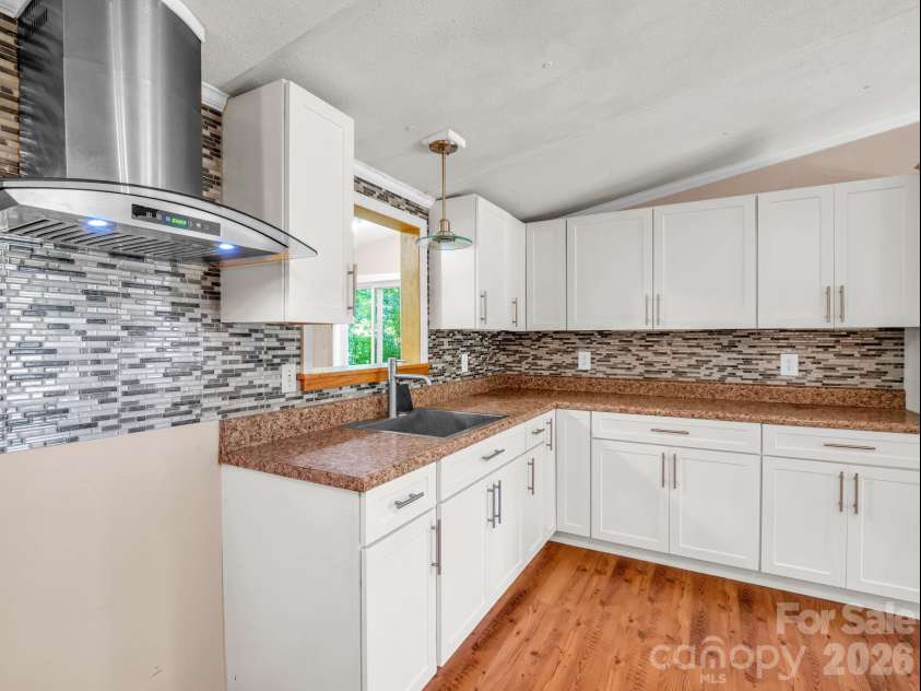 11 Charlie Hill Memorial Drive, Fairview, NC 28730.  MLS# CAR4398558, YatesRealty ID 36610. Main home kitchen