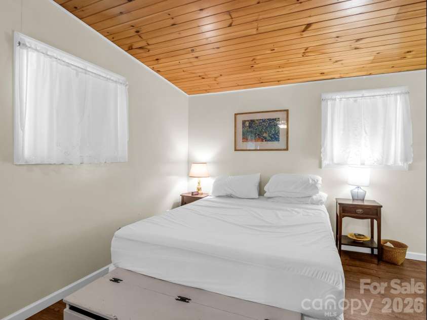 11 Charlie Hill Memorial Drive, Fairview, NC 28730.  MLS# CAR4398558, YatesRealty ID 36610. Tiny home bedroom