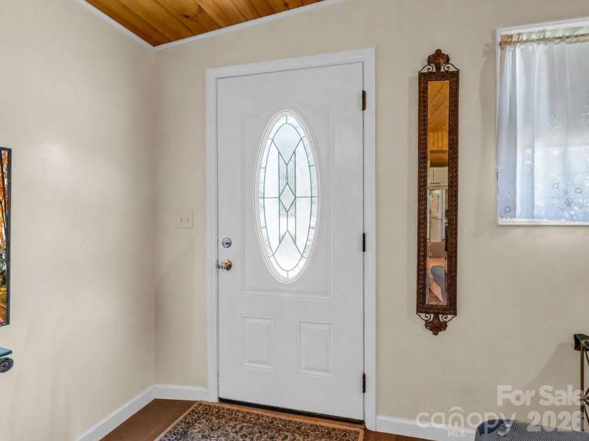 11 Charlie Hill Memorial Drive, Fairview, NC 28730.  MLS# CAR4398558, YatesRealty ID 36610. Tiny home entrance