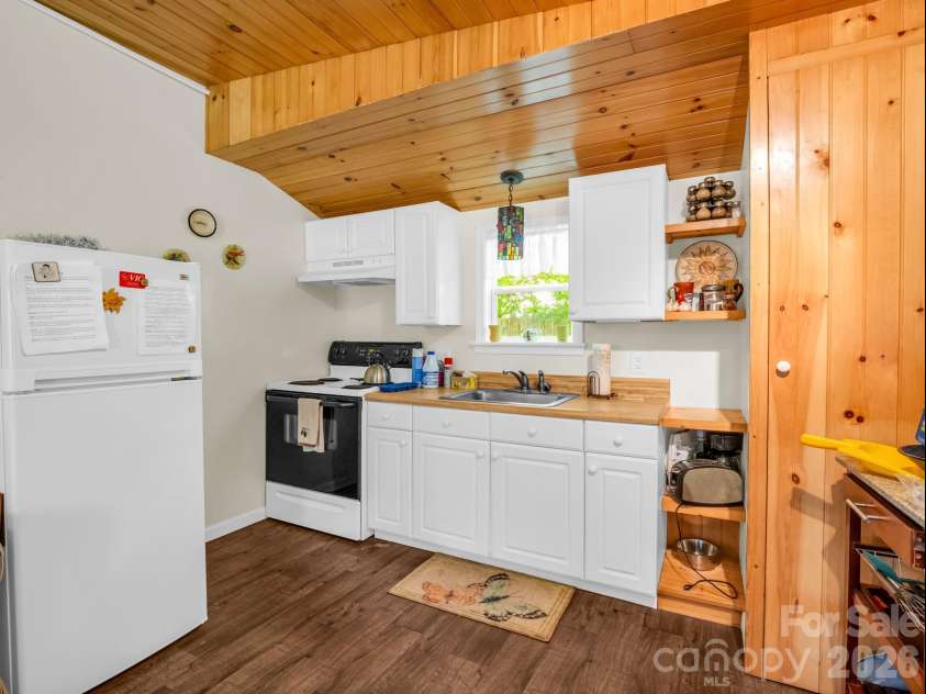 11 Charlie Hill Memorial Drive, Fairview, NC 28730.  MLS# CAR4398558, YatesRealty ID 36610. Tiny home kitchen