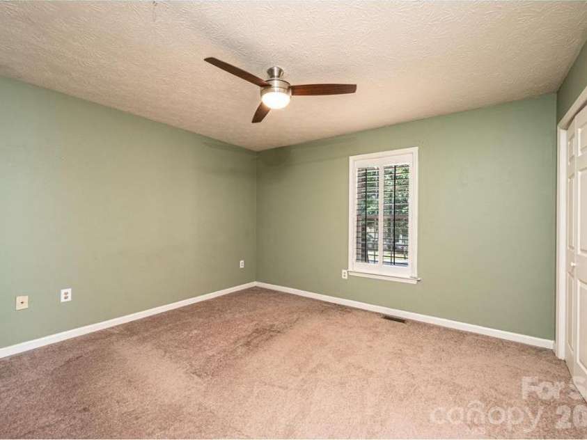 185 Hickman Avenue, Hudson, NC 28638.  MLS# CAR4399442, YatesRealty ID 36613. 2nd bedroom