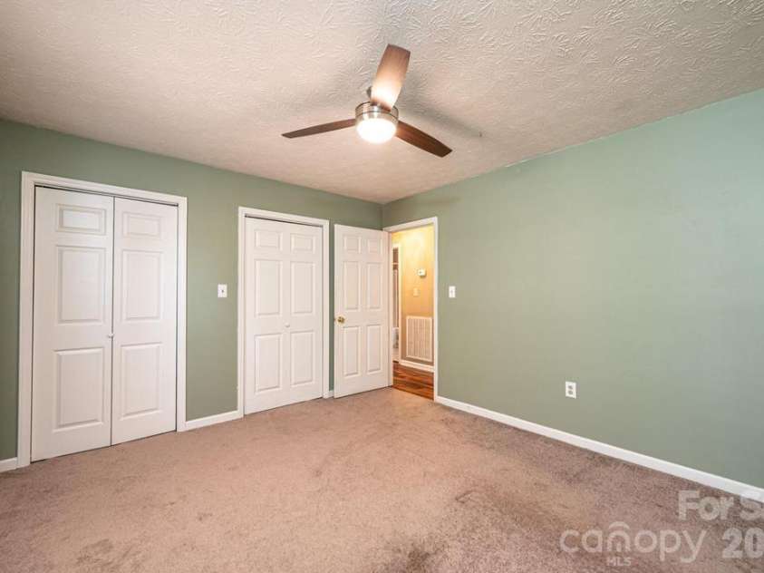 185 Hickman Avenue, Hudson, NC 28638.  MLS# CAR4399442, YatesRealty ID 36613. 2nd bedroom. Great closet space.