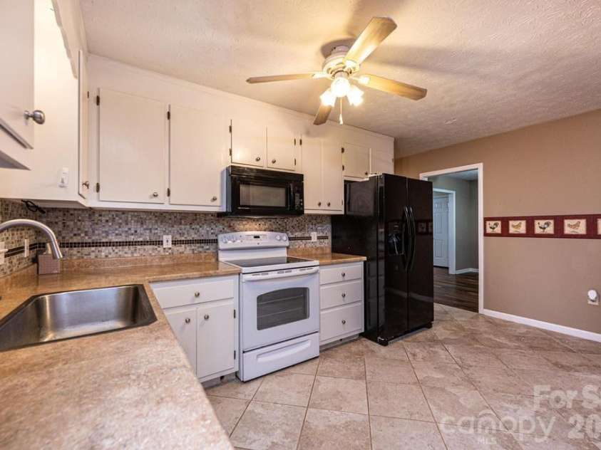 185 Hickman Avenue, Hudson, NC 28638.  MLS# CAR4399442, YatesRealty ID 36613. 