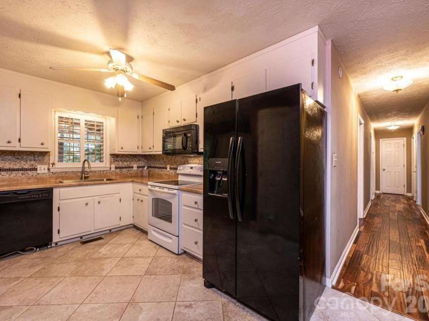 185 Hickman Avenue, Hudson, NC 28638.  MLS# CAR4399442, YatesRealty ID 36613. 