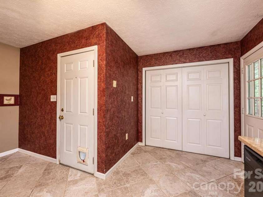 185 Hickman Avenue, Hudson, NC 28638.  MLS# CAR4399442, YatesRealty ID 36613. Laundry area.