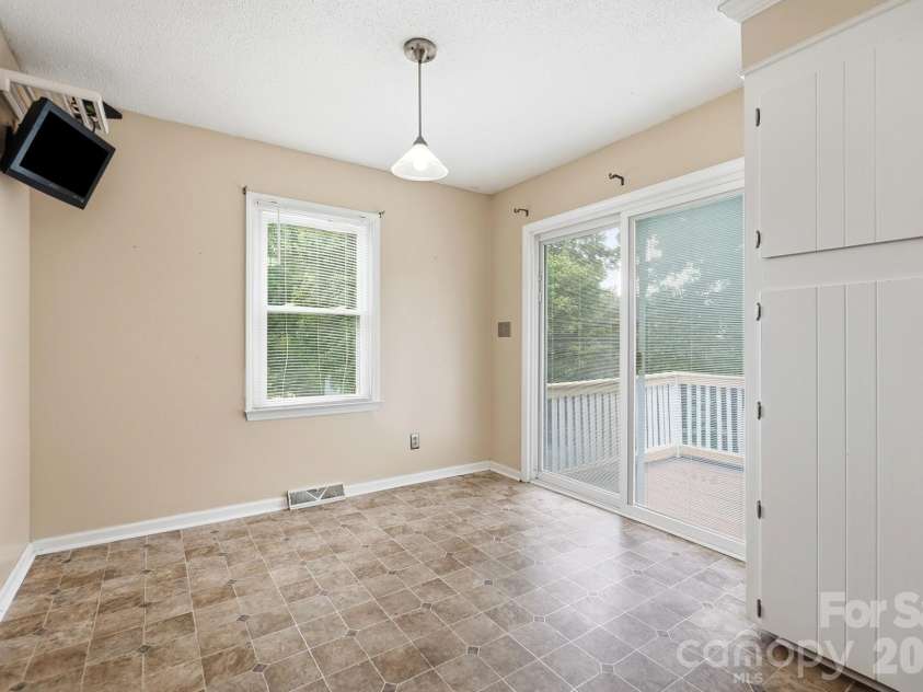 2600 Providence Drive, Gastonia, NC 28052.  MLS# CAR4381747, YatesRealty ID 36615. Access the large deck from the breakfast area
