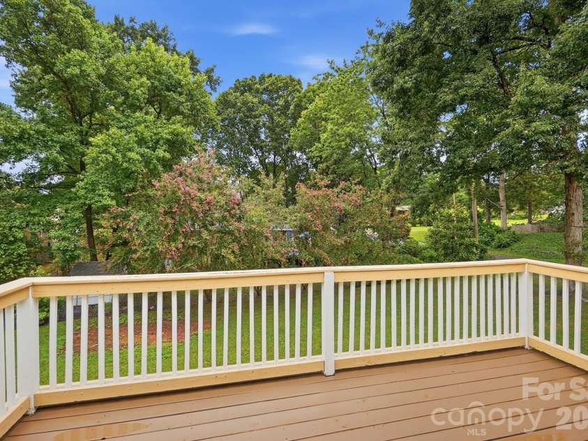 2600 Providence Drive, Gastonia, NC 28052.  MLS# CAR4381747, YatesRealty ID 36615. Spacious deck overlooking a private back yard