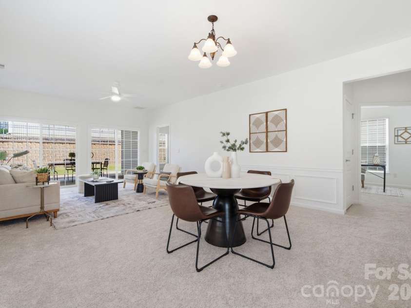 17510 Hawks View Drive, Fort Mill, SC 29707.  MLS# CAR4397865, YatesRealty ID 36623. Open floorplan flows seamlessly from dining to entertainment. Fresh light colored paint and neutral carpet brings cohesion to the home.