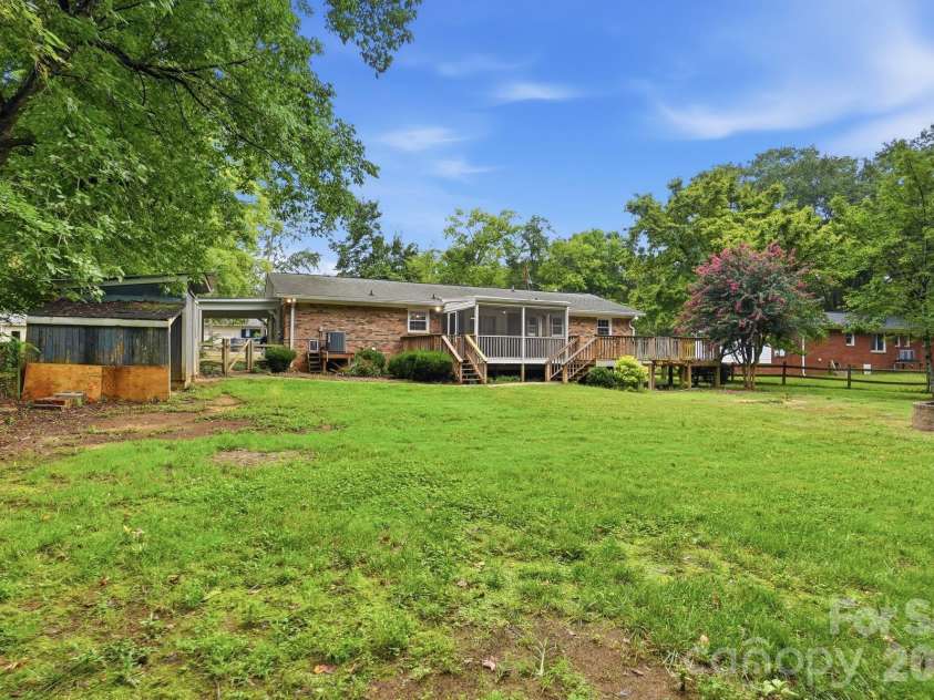 6081 Cambridge Drive, Harrisburg, NC 28075.  MLS# CAR4410918, YatesRealty ID 36625. Back