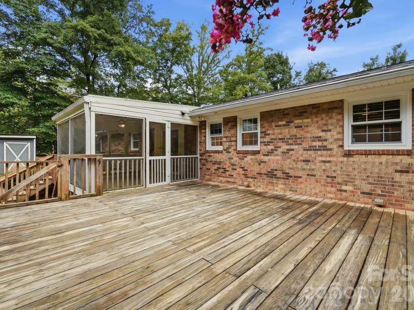 6081 Cambridge Drive, Harrisburg, NC 28075.  MLS# CAR4410918, YatesRealty ID 36625. Before painting deck