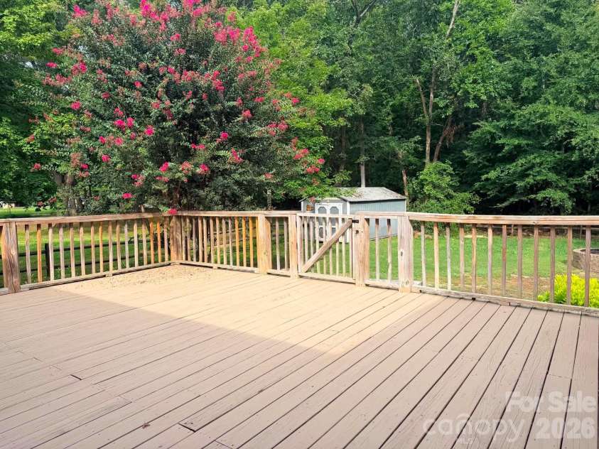6081 Cambridge Drive, Harrisburg, NC 28075.  MLS# CAR4410918, YatesRealty ID 36625. Deck main