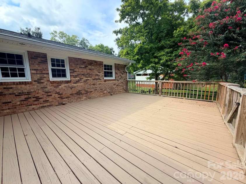 6081 Cambridge Drive, Harrisburg, NC 28075.  MLS# CAR4410918, YatesRealty ID 36625. Deck main