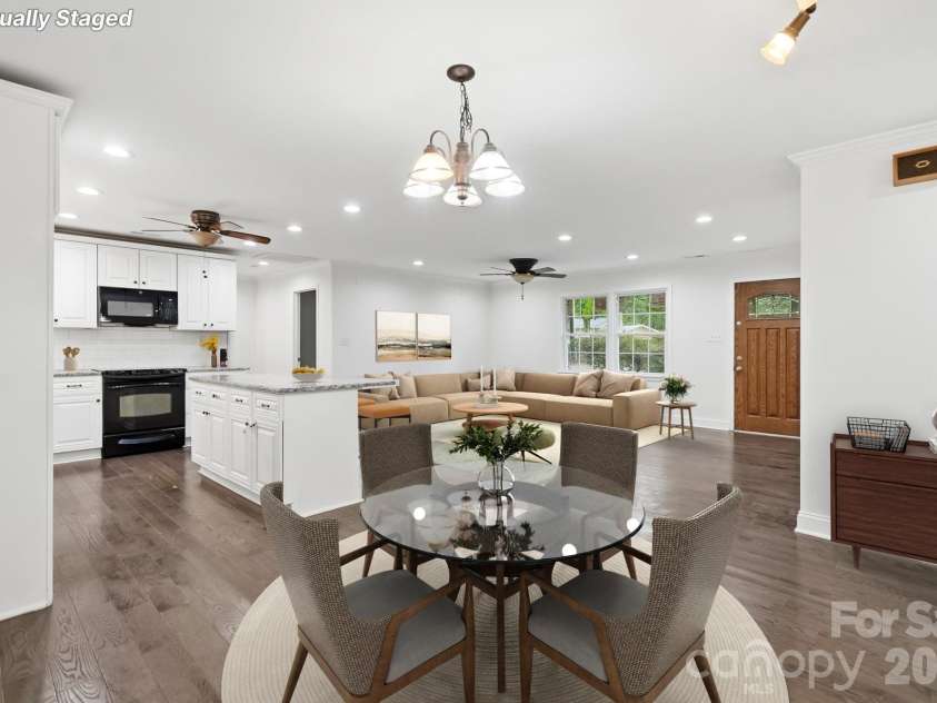 6081 Cambridge Drive, Harrisburg, NC 28075.  MLS# CAR4410918, YatesRealty ID 36625. Dining and living room
