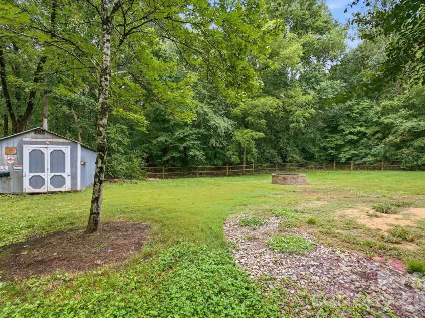6081 Cambridge Drive, Harrisburg, NC 28075.  MLS# CAR4410918, YatesRealty ID 36625. Shed