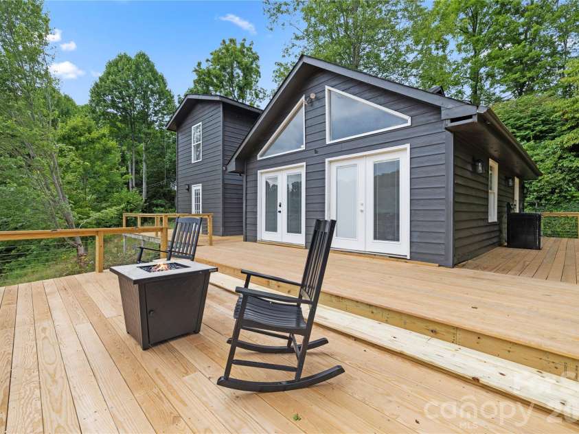 3954 NC 80 Highway, Bakersville, NC 28705.  MLS# CAR4403358, YatesRealty ID 36627. Large wrap around deck