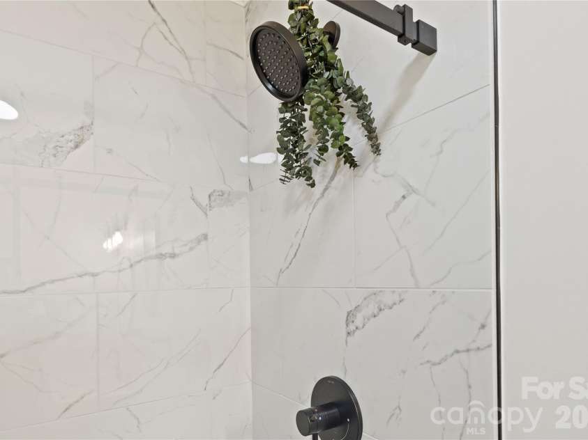 3954 NC 80 Highway, Bakersville, NC 28705.  MLS# CAR4403358, YatesRealty ID 36627. Lower Bathroom