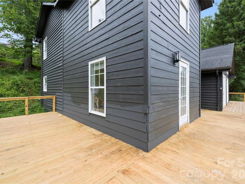 3954 NC 80 Highway, Bakersville, NC 28705.  MLS# CAR4403358, YatesRealty ID 36627. Wrap around deck