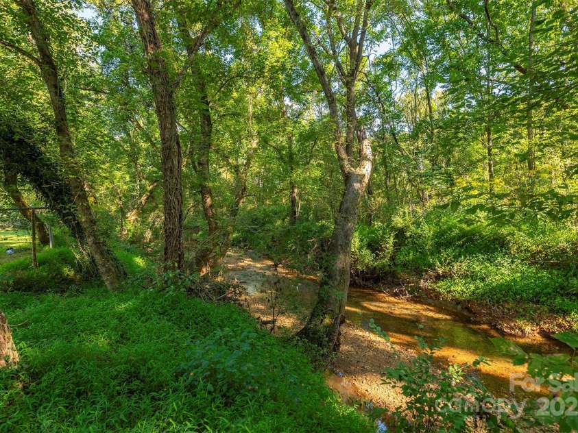 2305 Rutherford Road, Marion, NC 28752.  MLS# CAR4300683, YatesRealty ID 3663. Creek