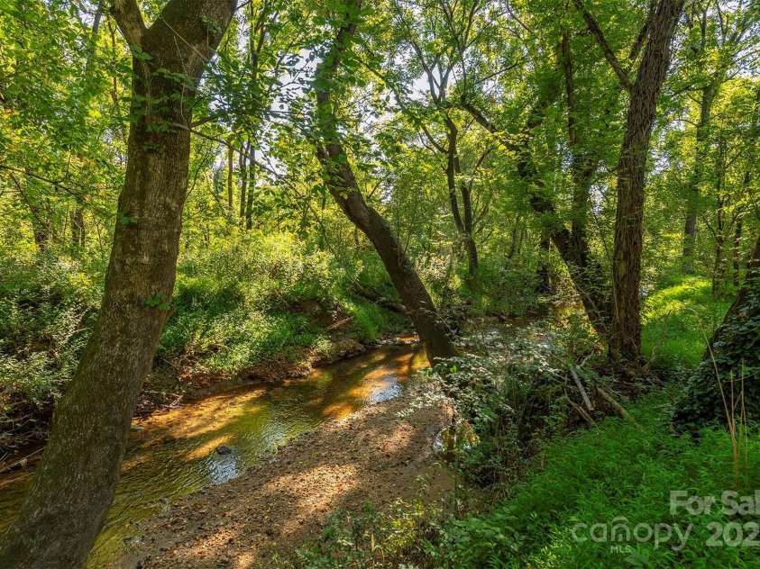 2305 Rutherford Road, Marion, NC 28752.  MLS# CAR4300683, YatesRealty ID 3663. Creek
