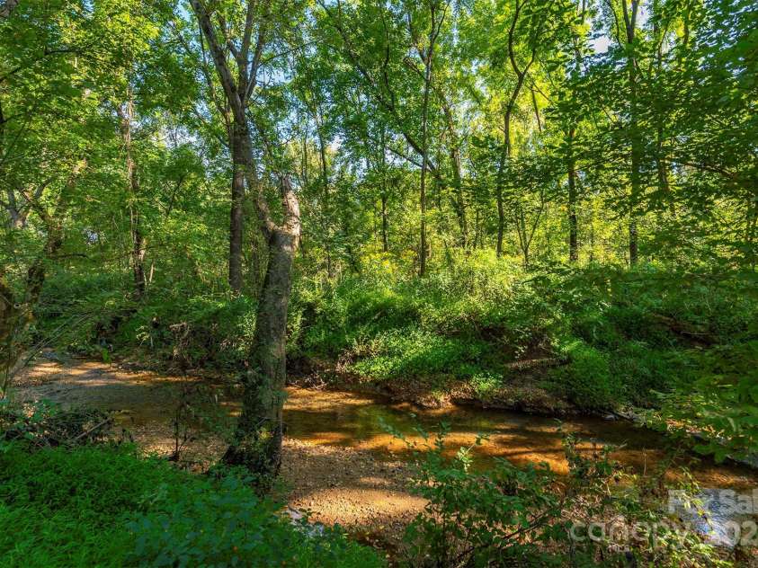 2305 Rutherford Road, Marion, NC 28752.  MLS# CAR4300683, YatesRealty ID 3663. Creek