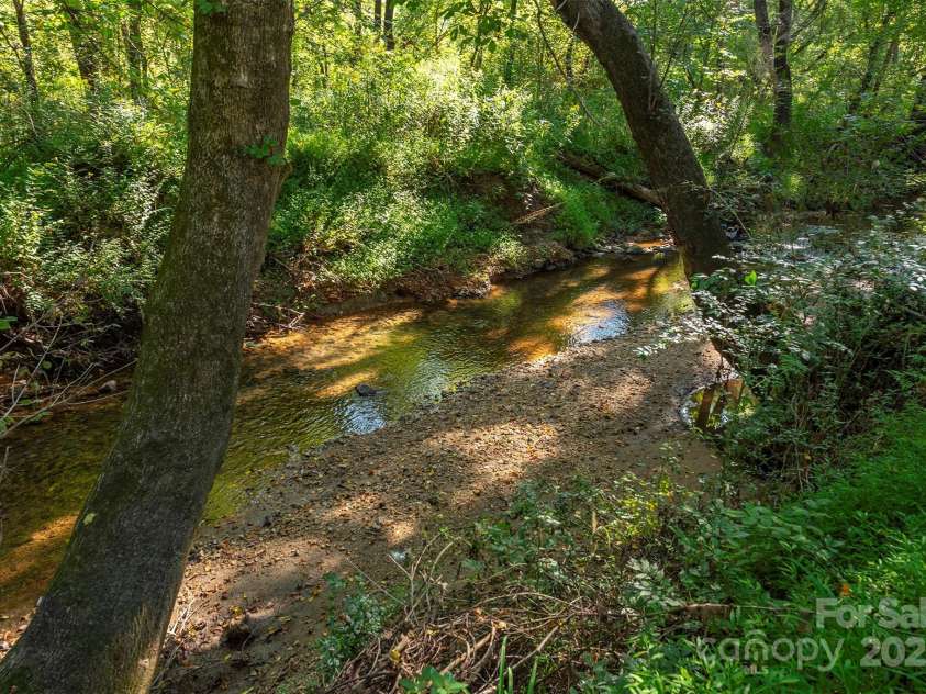 2305 Rutherford Road, Marion, NC 28752.  MLS# CAR4300683, YatesRealty ID 3663. Creek