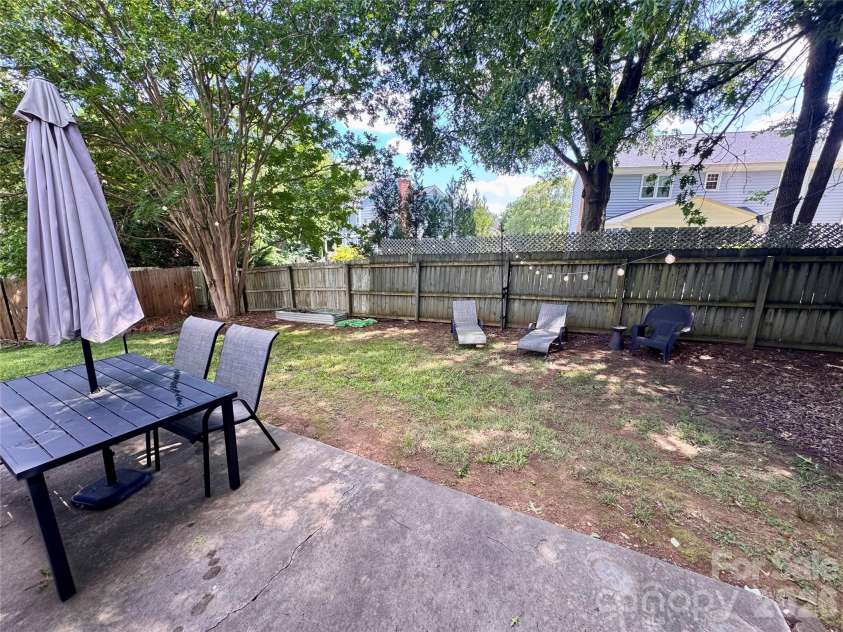 3373 Prescott Place, Concord, NC 28027.  MLS# CAR4398909, YatesRealty ID 36641. Back Patio and yard