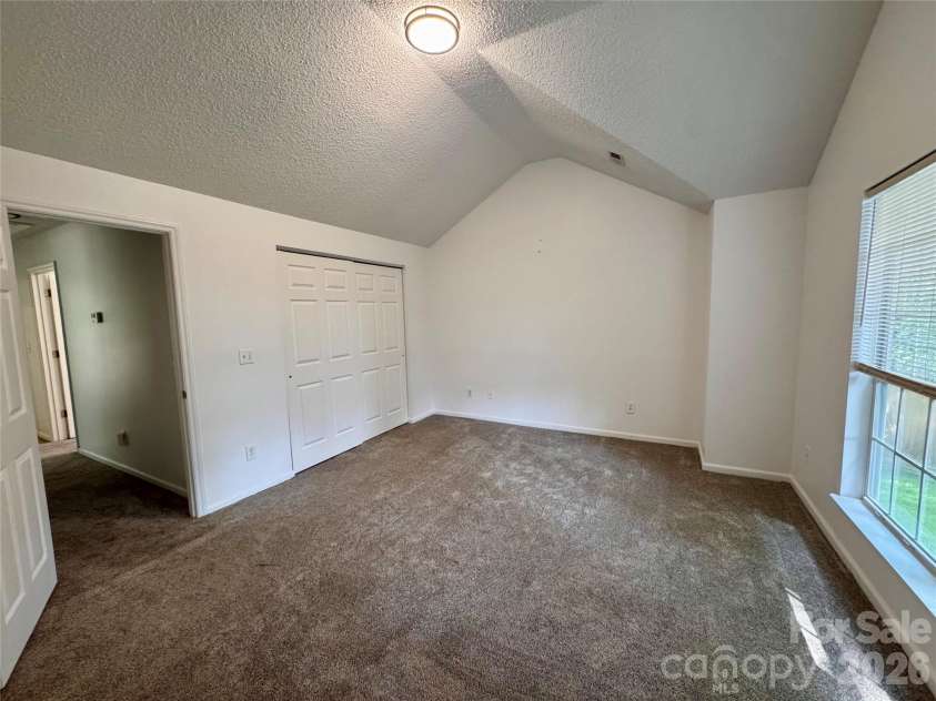 3373 Prescott Place, Concord, NC 28027.  MLS# CAR4398909, YatesRealty ID 36641. Primary bedroom