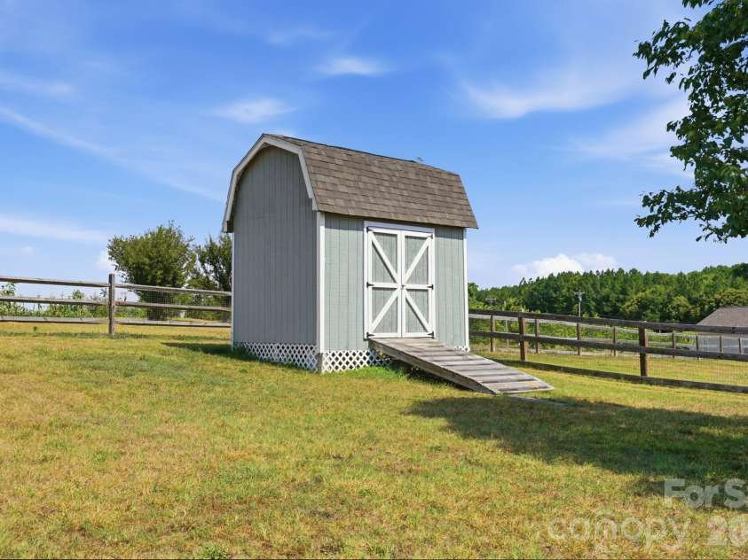 154 Back Acres Lane, Kannapolis, NC 28081.  MLS# CAR4402873, YatesRealty ID 36655. Storage Shed
