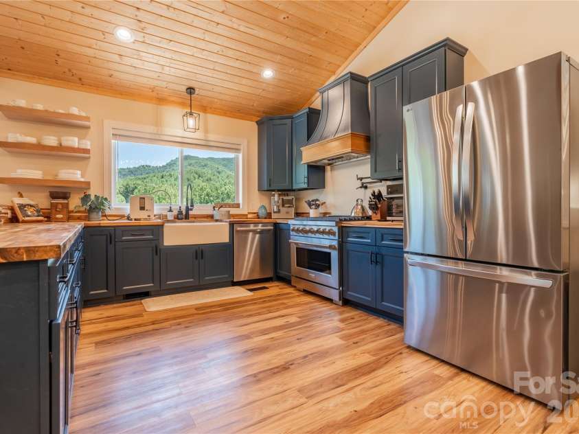 793 State Highway 197 South, Burnsville, NC 28714.  MLS# CAR4401366, YatesRealty ID 36660. Custom Kitchen-Navy