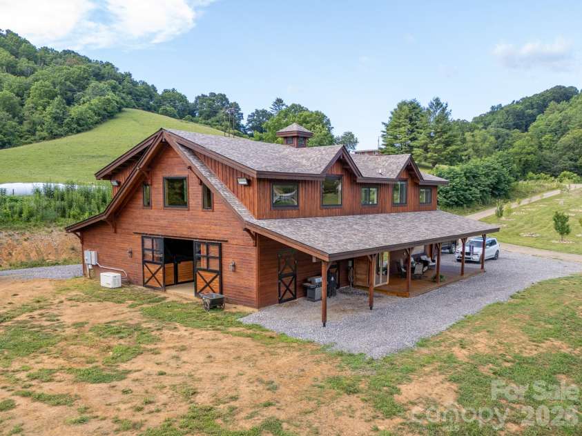 793 State Highway 197 South, Burnsville, NC 28714.  MLS# CAR4401366, YatesRealty ID 36660. Custom Timber Framed Home