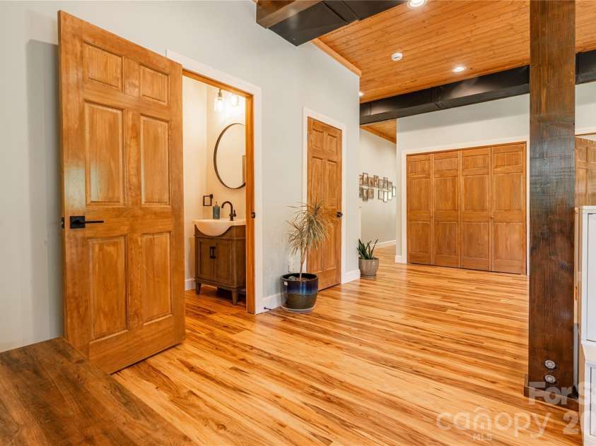 793 State Highway 197 South, Burnsville, NC 28714.  MLS# CAR4401366, YatesRealty ID 36660. Half Bath