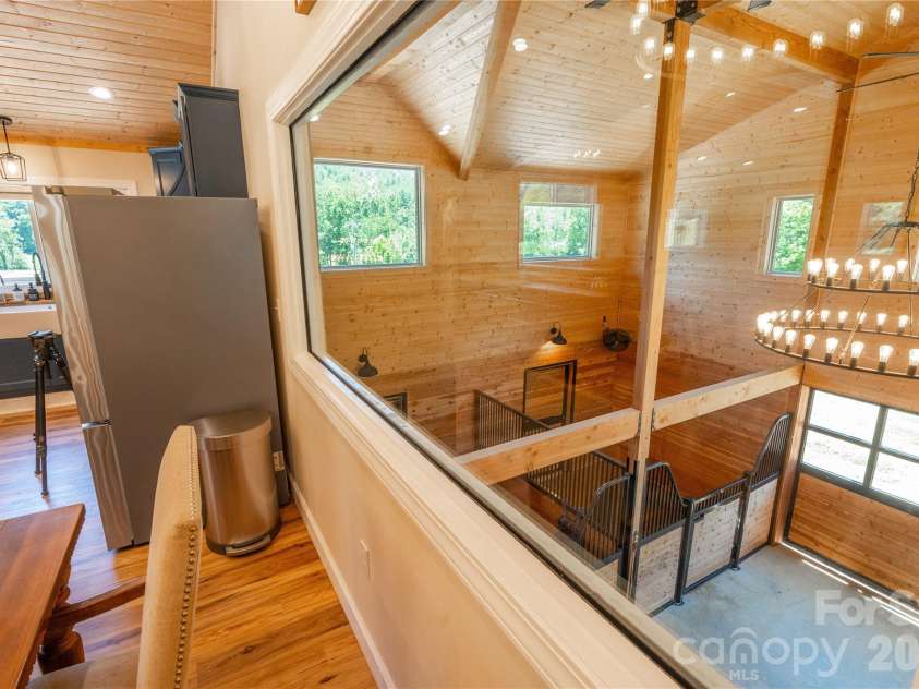793 State Highway 197 South, Burnsville, NC 28714.  MLS# CAR4401366, YatesRealty ID 36660. Large Window over looking Equestrian Facilities
