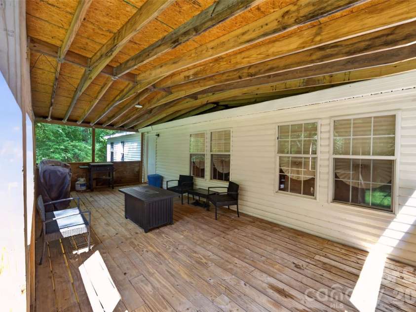 4014 Eutaw Drive, Waxhaw, NC 28173.  MLS# CAR4403095, YatesRealty ID 36667. Back porch / outdoor entertainment space